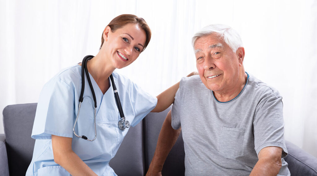 Doctor supporting patient during check-up.