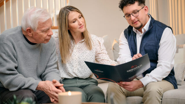 Family consulting with professional at home.